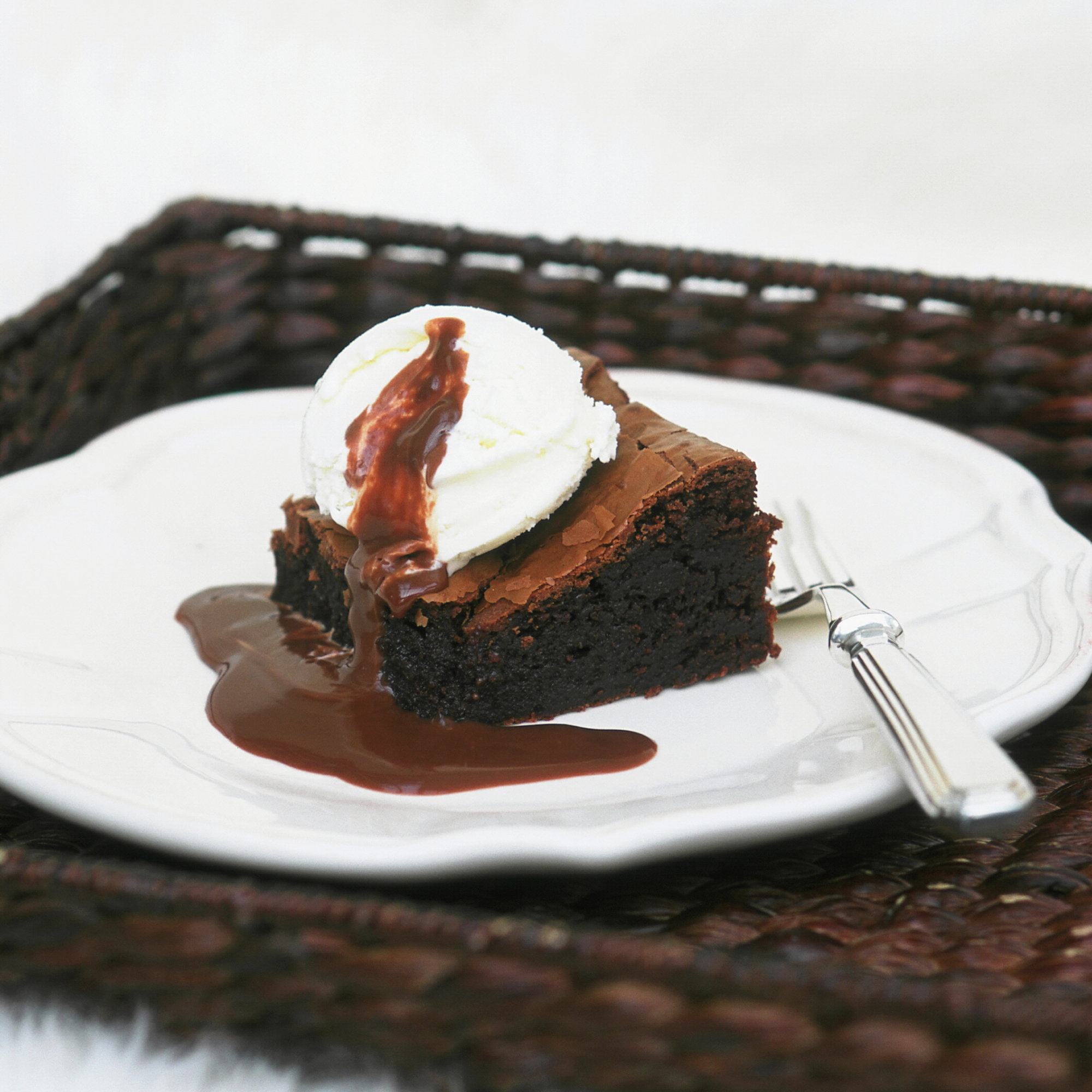 chocolate brownies with hot fudge sauce woman and home